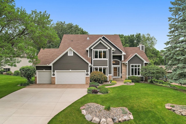 11582 Raspberry Hill Rd, Eden Prairie, MN 55344 - view of front of property with driveway, a front lawn, brick siding, and a garage