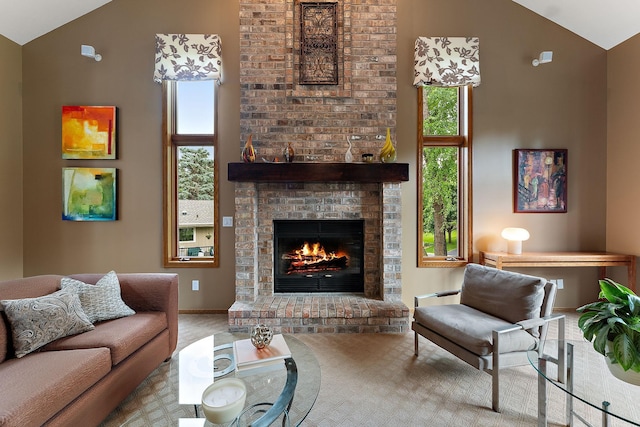 11582 Raspberry Hill Rd, Eden Prairie, MN 55344 - living area with healthy amount of natural light, high vaulted ceiling, and a brick fireplace