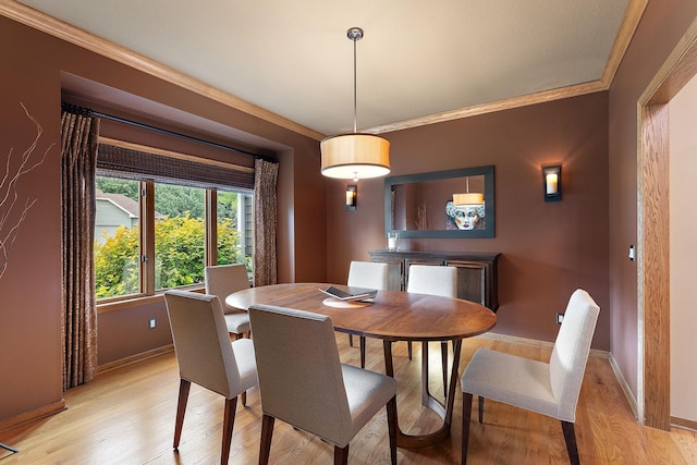 11582 Raspberry Hill Rd, Eden Prairie, MN 55344 - dining room with ornamental molding and light wood-style floors