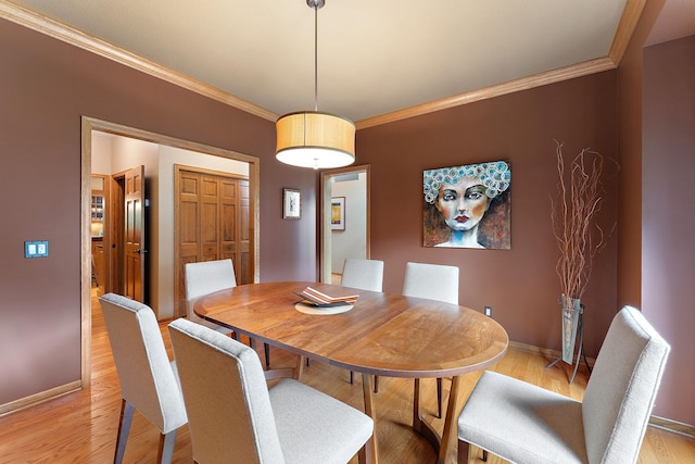 11582 Raspberry Hill Rd, Eden Prairie, MN 55344 - dining area with ornamental molding and light wood finished floors