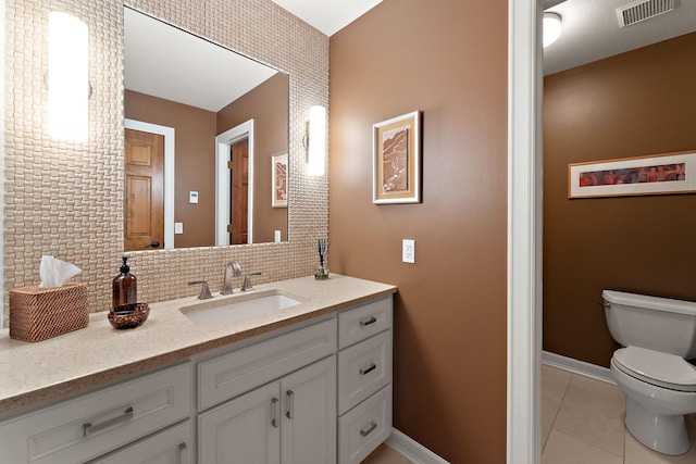 11582 Raspberry Hill Rd, Eden Prairie, MN 55344 - bathroom featuring tile patterned floors, vanity, and tasteful backsplash