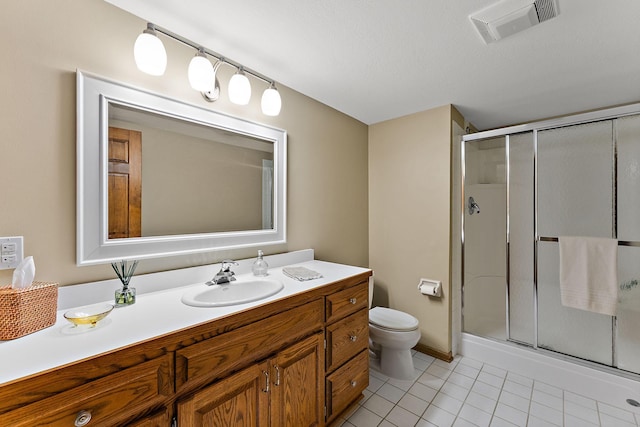 11582 Raspberry Hill Rd, Eden Prairie, MN 55344 - bathroom featuring a stall shower, vanity, and tile patterned floors