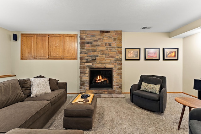 11582 Raspberry Hill Rd, Eden Prairie, MN 55344 - carpeted living area featuring a stone fireplace and baseboards