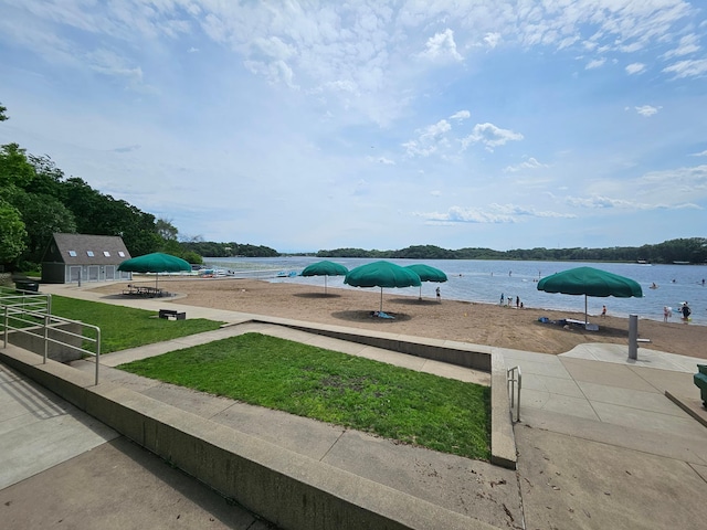 11582 Raspberry Hill Rd, Eden Prairie, MN 55344 - view of grassy yard with a water view and an outdoor structure