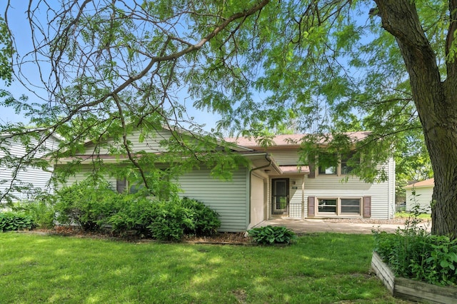 507 17 1/2 St SE, Rochester, MN 55904 - back of house with a yard and a patio area