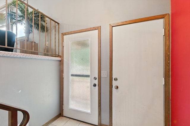 507 17 1/2 St SE, Rochester, MN 55904 - doorway with healthy amount of natural light and light tile patterned floors