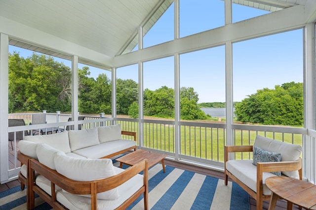 11540 Eckert Ave SE, Franklin Twp, MN 55328 - sunroom with outdoor lounge area, vaulted ceiling, view of scattered trees, and a water view