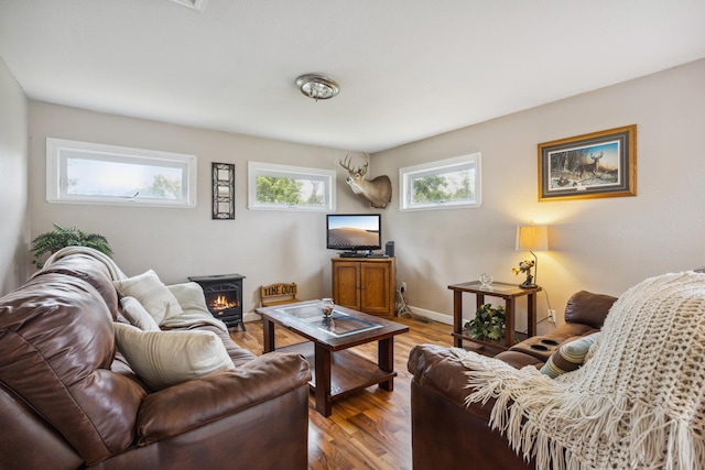 6342 Baker Ave NE, Fridley, MN 55432 - living area with wood finished floors and a wood stove