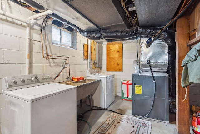 6342 Baker Ave NE, Fridley, MN 55432 - laundry room with washer and clothes dryer and heating unit