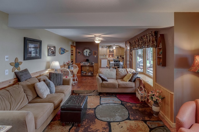 35139 County 39, Laporte, MN 56461 - living area featuring ceiling fan, wood finished floors, wainscoting, and wood walls