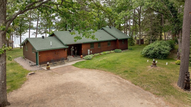 35139 County 39, Laporte, MN 56461 - back of house with a shingled roof, a yard, and driveway