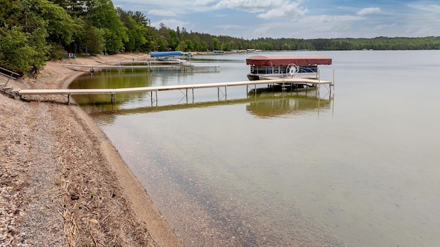 35139 County 39, Laporte, MN 56461 - water view featuring a heavily wooded area and a dock