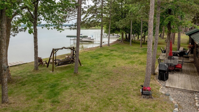 35139 County 39, Laporte, MN 56461 - view of grassy yard featuring a water view and a dock