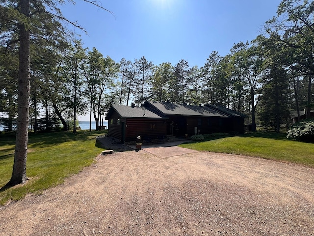 35139 County 39, Laporte, MN 56461 - view of front facade with driveway, a front yard, and a water view