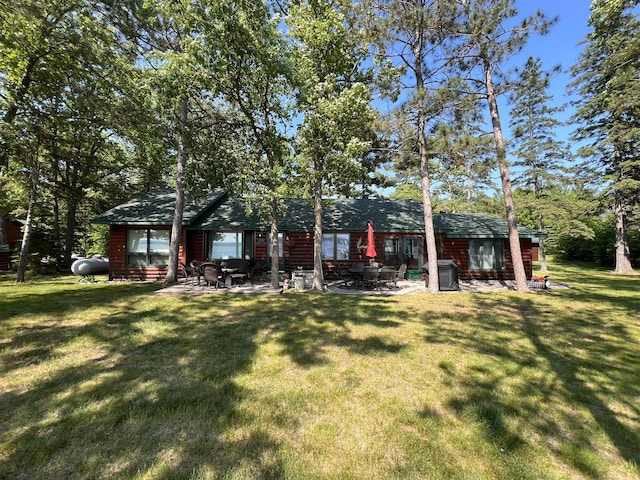 35139 County 39, Laporte, MN 56461 - view of grassy yard with a patio