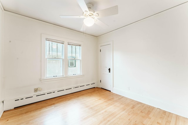 1787 Randolph Ave, Saint Paul, MN 55105 - unfurnished room with baseboard heating, wood finished floors, and ceiling fan