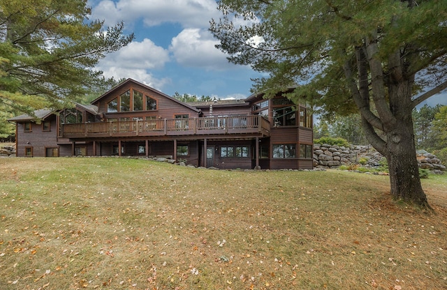 1116 Sand Lake Dr NW, Backus, MN 56435 - back of house with a yard, a wooden deck, and log veneer siding