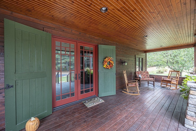 1116 Sand Lake Dr NW, Backus, MN 56435 - wooden porch featuring french doors
