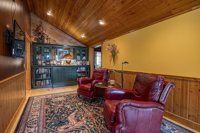 1116 Sand Lake Dr NW, Backus, MN 56435 - living area with wooden walls, wood ceiling, lofted ceiling, and hardwood / wood-style flooring