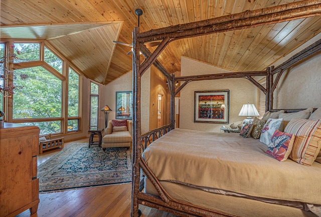 1116 Sand Lake Dr NW, Backus, MN 56435 - bedroom featuring wood ceiling, lofted ceiling, hardwood / wood-style floors, and a textured wall