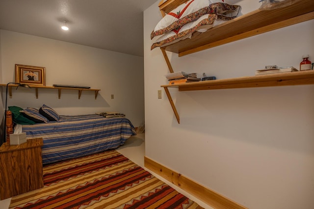 1116 Sand Lake Dr NW, Backus, MN 56435 - bedroom featuring baseboards and wood finished floors