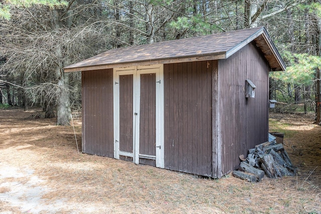 1116 Sand Lake Dr NW, Backus, MN 56435 - view of shed featuring a view of trees