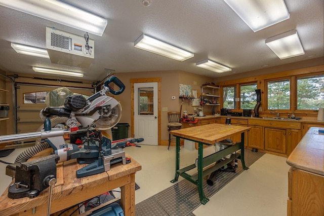 1116 Sand Lake Dr NW, Backus, MN 56435 - office featuring a textured ceiling and concrete floors