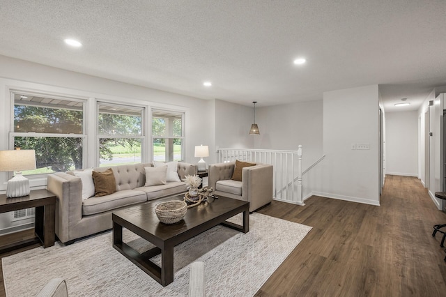 4909 98th St, Bloomington, MN 55437 - living area with wood finished floors, recessed lighting, and a textured ceiling