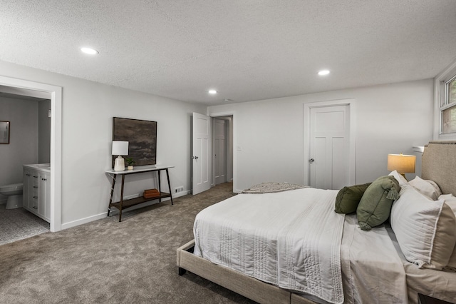 4909 98th St, Bloomington, MN 55437 - carpeted bedroom featuring recessed lighting, a textured ceiling, and ensuite bathroom