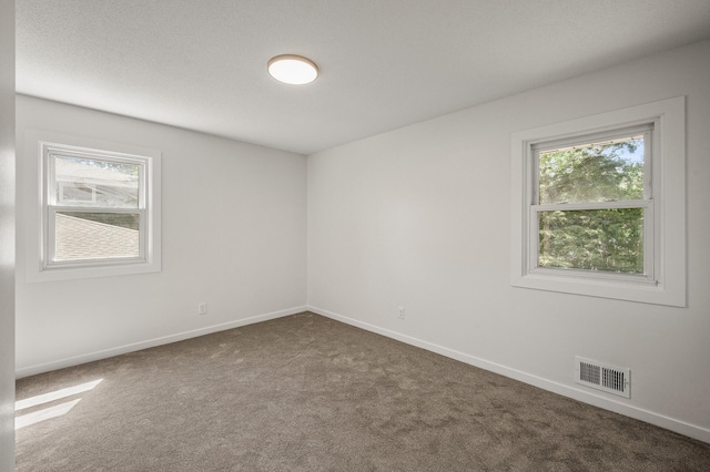 4909 98th St, Bloomington, MN 55437 - carpeted spare room featuring baseboards
