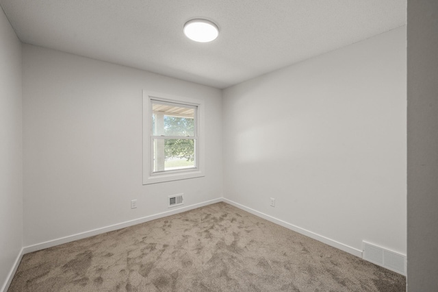4909 98th St, Bloomington, MN 55437 - carpeted empty room featuring baseboards