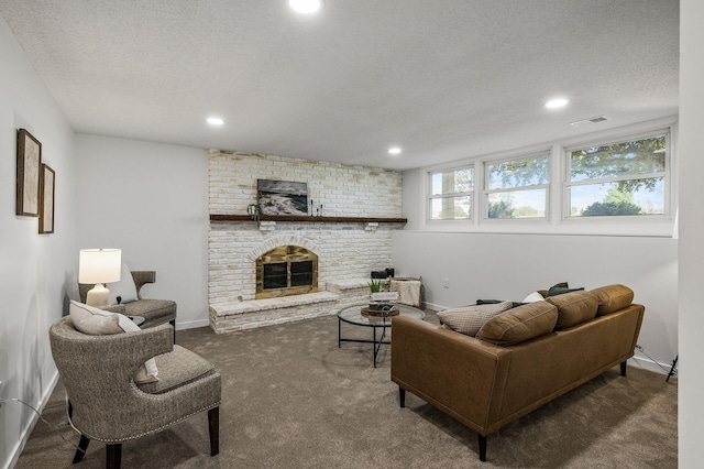 4909 98th St, Bloomington, MN 55437 - carpeted living area with a brick fireplace, a textured ceiling, and recessed lighting