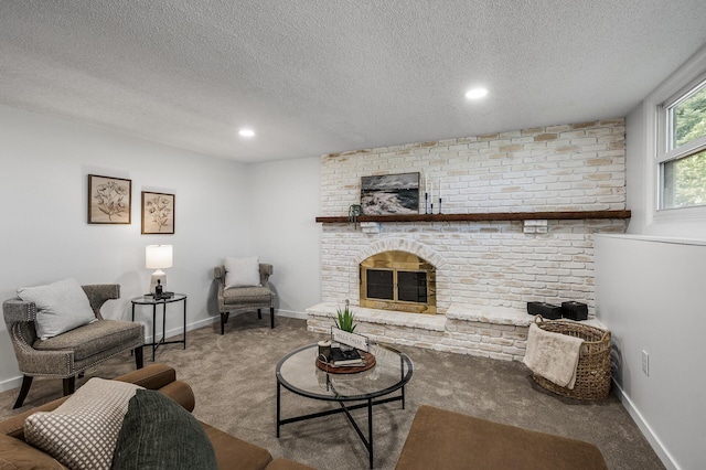 4909 98th St, Bloomington, MN 55437 - living area with carpet floors, a textured ceiling, a fireplace, and recessed lighting