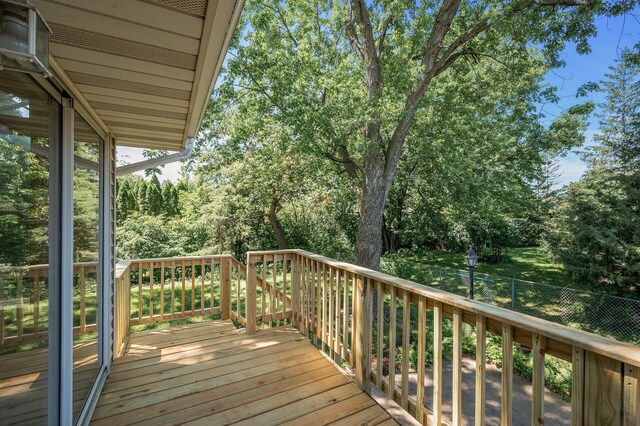 4909 98th St, Bloomington, MN 55437 - wooden deck featuring view of scattered trees