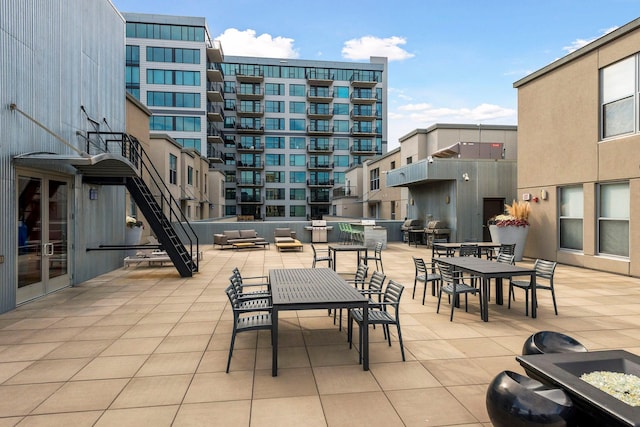521 7th St Unit 519, Minneapolis, MN 55415 - view of patio / terrace with an outdoor living space with a fire pit