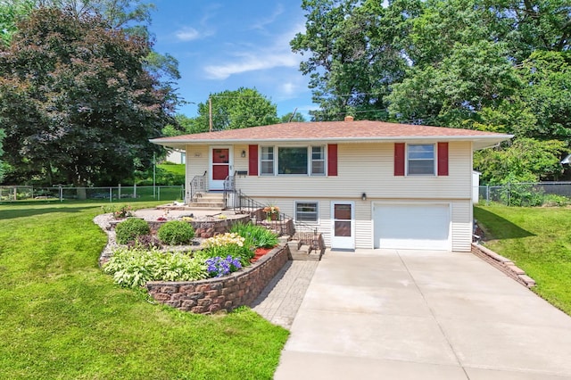 7447 Cleadis Way, Inver Grove Heights, MN 55076 - bi-level home featuring concrete driveway and an attached garage