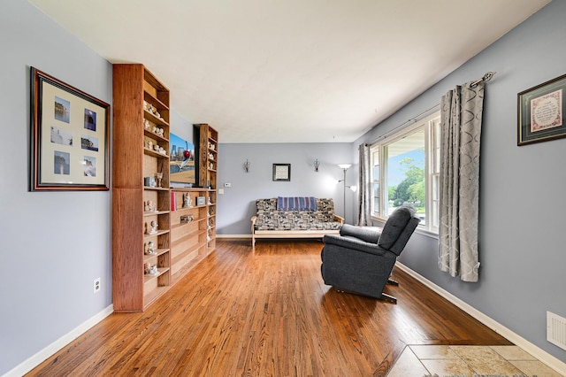 7447 Cleadis Way, Inver Grove Heights, MN 55076 - living area featuring wood finished floors and baseboards