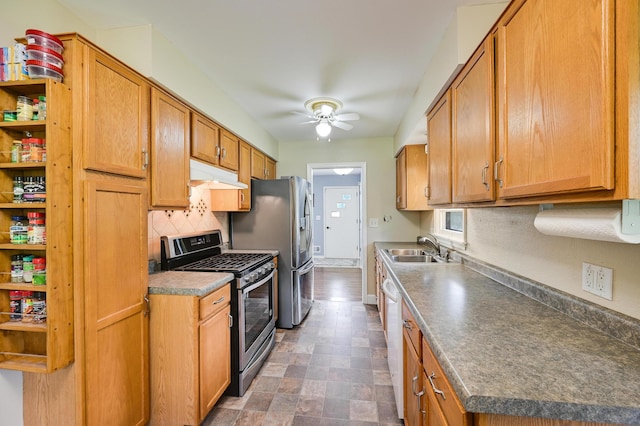 7447 Cleadis Way, Inver Grove Heights, MN 55076 - kitchen with stainless steel appliances, under cabinet range hood, a ceiling fan, tasteful backsplash, and brown cabinetry