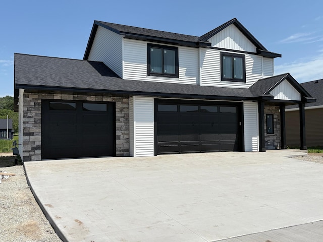 3617 Meadow Sage Ct SE, Rochester, MN 55904 - view of front of house featuring stone siding, a garage, driveway, and roof with shingles