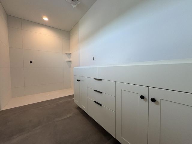 3617 Meadow Sage Ct SE, Rochester, MN 55904 - full bath featuring tiled shower, recessed lighting, and concrete flooring