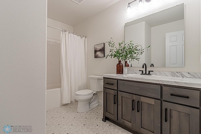 6724 32nd St S, Fargo, ND 58104 - bathroom featuring vanity and shower / bath combo with shower curtain