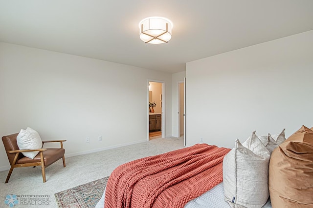 6724 32nd St S, Fargo, ND 58104 - bedroom with light colored carpet and ensuite bathroom