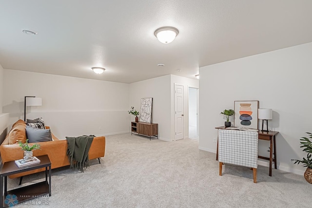 6724 32nd St S, Fargo, ND 58104 - sitting room with carpet floors and baseboards