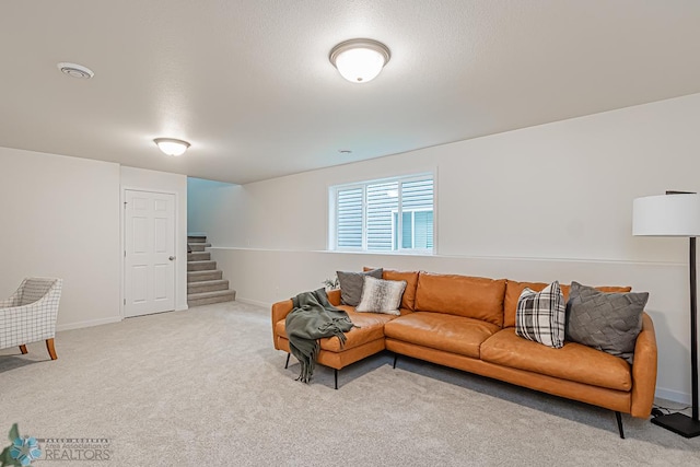 6724 32nd St S, Fargo, ND 58104 - carpeted living area featuring stairs and baseboards