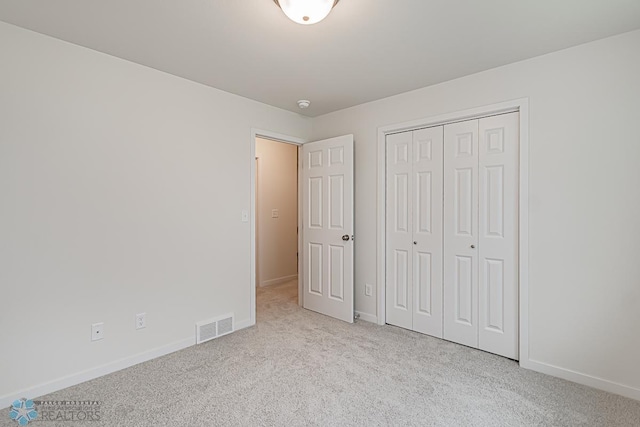 6724 32nd St S, Fargo, ND 58104 - unfurnished bedroom with carpet flooring and a closet