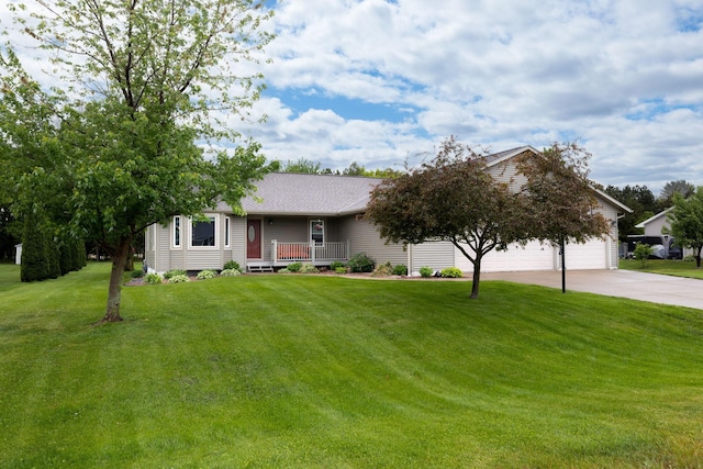 N8343 Mcwain Dr, Holland Twp, WI 54636 - view of front of home featuring concrete driveway, a front lawn, and an attached garage