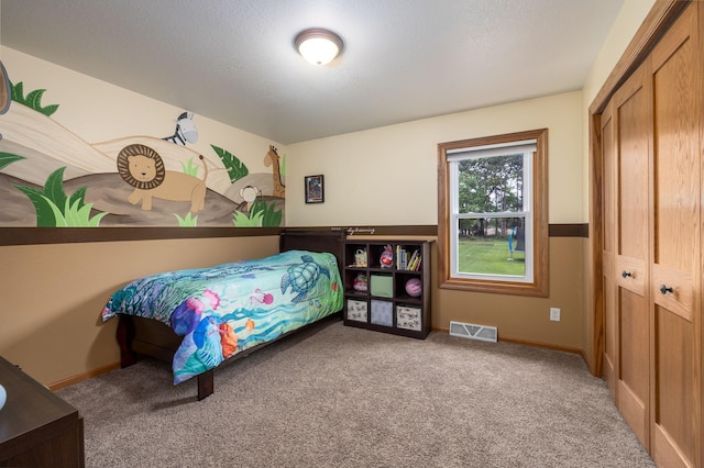 N8343 Mcwain Dr, Holland Twp, WI 54636 - carpeted bedroom featuring a closet and baseboards