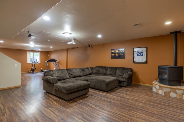 N8343 Mcwain Dr, Holland Twp, WI 54636 - living area featuring wood finished floors, recessed lighting, and a wood stove