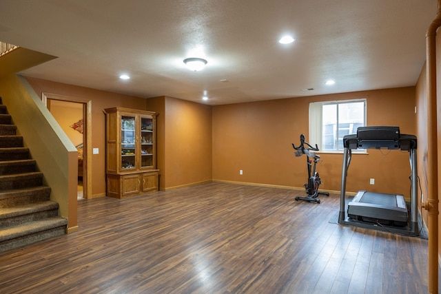 N8343 Mcwain Dr, Holland Twp, WI 54636 - exercise area featuring dark wood-type flooring and recessed lighting