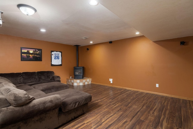 N8343 Mcwain Dr, Holland Twp, WI 54636 - living area with wood finished floors, recessed lighting, and a wood stove